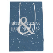 雪片の中のクリスマスの白猫 ミディアムペーパーバッグ (裏面)