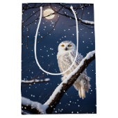 雪片の中のクリスマススノーフクロウ ミディアムペーパーバッグ (正面)