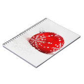 雪片の付いた赤いクリスマスボール ノートブック (左側)