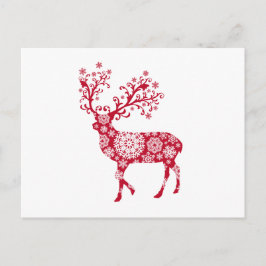 雪片を持つ赤いクリスマスのシカ シーズンポストカード
