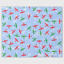 雪片を通した飛んでいるクリスマスセスナス