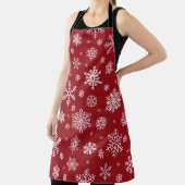 雪片、赤い装飾、クリスマスパターン。 エプロン (インサイチュ)