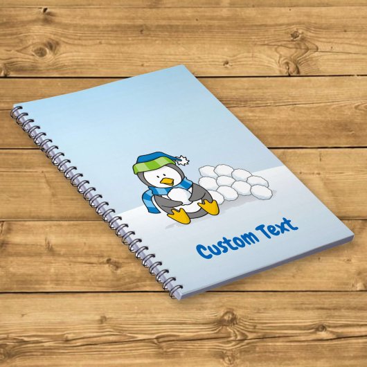 雪玉を持つペンギンのイラスト ノートブック
