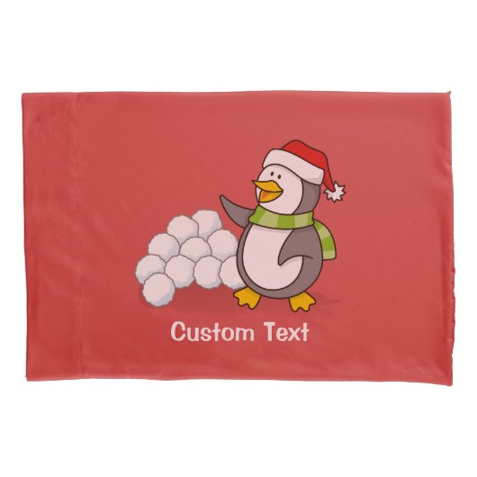 雪玉を振るクリスマスペンギン 枕カバー (正面)