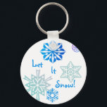 雪色選択の背景 キーホルダー<br><div class="desc">暑さに疲れて雪の準備ができているか？キーチェーンはキミのためだ！文字読は「雪を降らせろ！と青と白のグラデーションの雪に囲まれている。自然と同様に、それぞれのスノーフレークは違うある。</div>