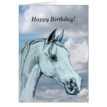 雲に対する灰色のアラブ馬