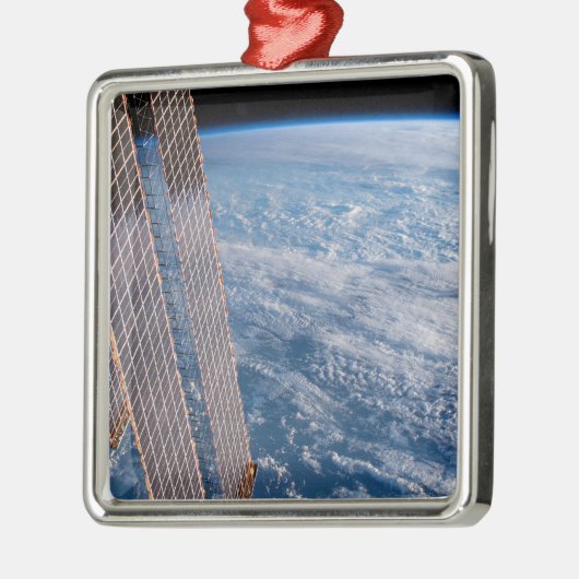 雲に覆われたタスマンとサンゴの海。 メタルオーナメント (左)