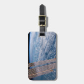 雲に覆われたタスマンとサンゴの海。 ラゲッジタグ (正面縦)