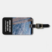 雲に覆われたタスマンとサンゴの海。 ラゲッジタグ (正面横)