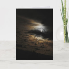 雲の輝く上の月光の写真空白の カード