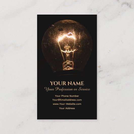 電おもしろい気筋の電球が暗闇を照らす 名刺 (裏面)