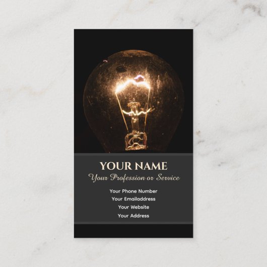 電おもしろい気筋の電球が暗闇を照らす 名刺 (裏面)