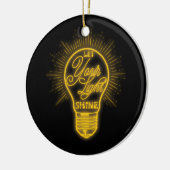 電球のグラフィックを明るく照らす セラミックオーナメント (左)