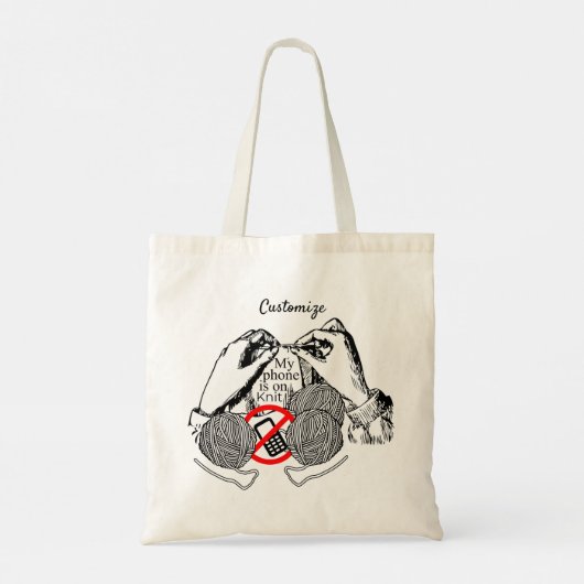 電話がニットThunder_Coveに入っている トートバッグ (裏面)