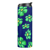 青いお洒落背景に緑の花のデイジー タンブラー (回転左)