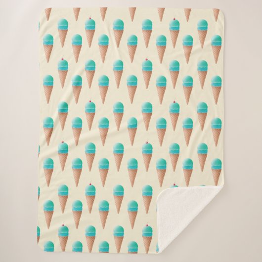青いアイスクリームのコーンパターン、淡い黄色 シェルパブランケット (正面)
