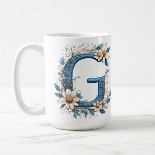 青いエナメルの装飾文字G コーヒーマグカップ (左)