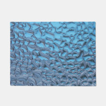 青いガラスに穏やかな雨滴