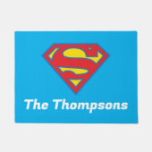 青いクラシック輪郭のスーパーガールロゴ ドアマット (正面)