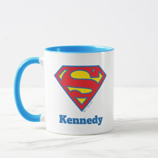 青いクラシック輪郭のスーパーガールロゴ マグカップ (左)