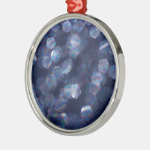 青いスパークル ボケ ライト メタルオーナメント (左)