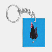 青いスポンジの上に黒い鶏を置き キーホルダー (正面左)