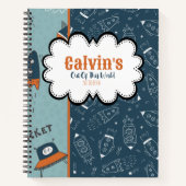 青いパターン名のスケッチ宇宙にドードルロケット ノートブック (正面)
