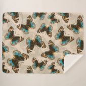 青いパンジー蝶のパターンがオフ白 シェルパブランケット (正面(横))