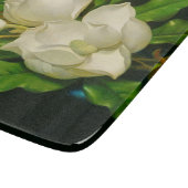 青いベルベットの布の上の巨大なマグノリア（ヒード） カッティングボード (角)