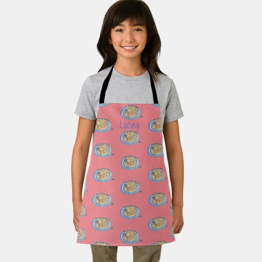 青い帽子おもしろいをかぶった漫画のキャラクター エプロン (インサイチュ)