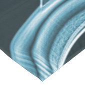 青い曲線の重なり合う帯がハイライト表示されたレリーフ、 浮き彫り テーブルクロス (アングル)