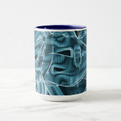 青い曲線の重なり合う帯がハイライト表示されたレリーフ、 浮き彫り マグカップ (中央)