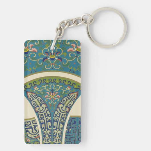 青い東洋のデザインと笑顔の顔 キーホルダー (裏面)