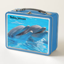 青い水に浮かぶ2頭のイルカ