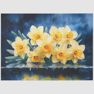 青い水の色のデコページ上の黄色の水仙 薄葉紙