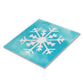 青い水の色の背景に白いスノーフレーク タイル (側面)