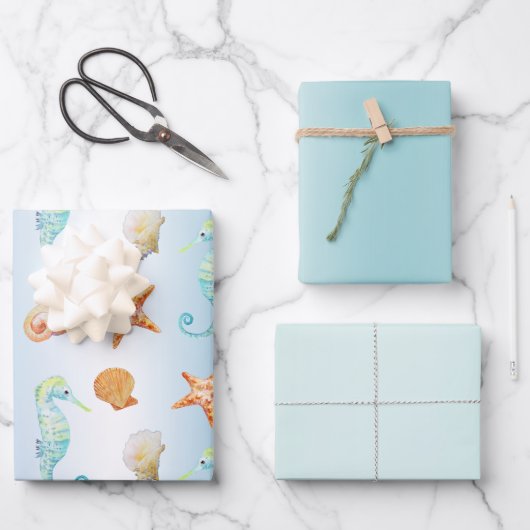 青い白い貝類グラデーションのヒトデ ラッピングペーパーシート (正面)