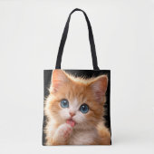 青い目の子猫の前足ペロペロ トートバッグ (正面)