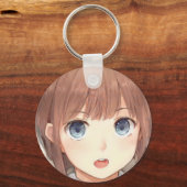 青い目をしたアニメの茶色い髪の女の子は驚いた キーホルダー (正面)
