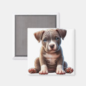 青い目を座って無邪気に見える子犬 マグネット (正面/裏面)
