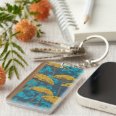 青い背景が付いている金Yarrowの庭 キーホルダー (正面右)