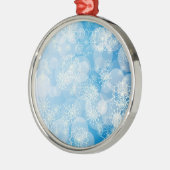 青い背景にクリスマスの雪の結晶 メタルオーナメント (左)