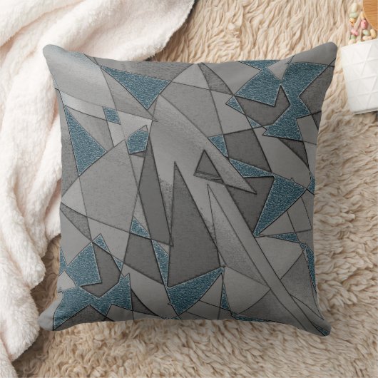 青い背景にグレーの三角形の切り出し、粗い クッション (ブランケット)