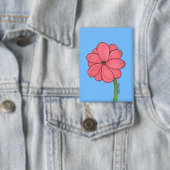 青い背景にピンクの花が一面 缶バッジ (インサイチュ)