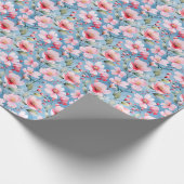 青い背景にピンクの花が咲く ラッピングペーパー (角)