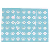 青い背景に手で印刷 ラージペーパーバッグ (裏面)