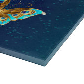 青い背景に浮かぶ金色の蝶 カッティングボード (角)