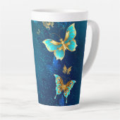 青い背景に浮かぶ金色の蝶 カフェラテマグ (右アングル)