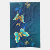 青い背景に浮かぶ金色の蝶 キッチンタオル (縦)