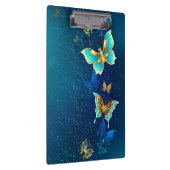 青い背景に浮かぶ金色の蝶 クリップボード (右)